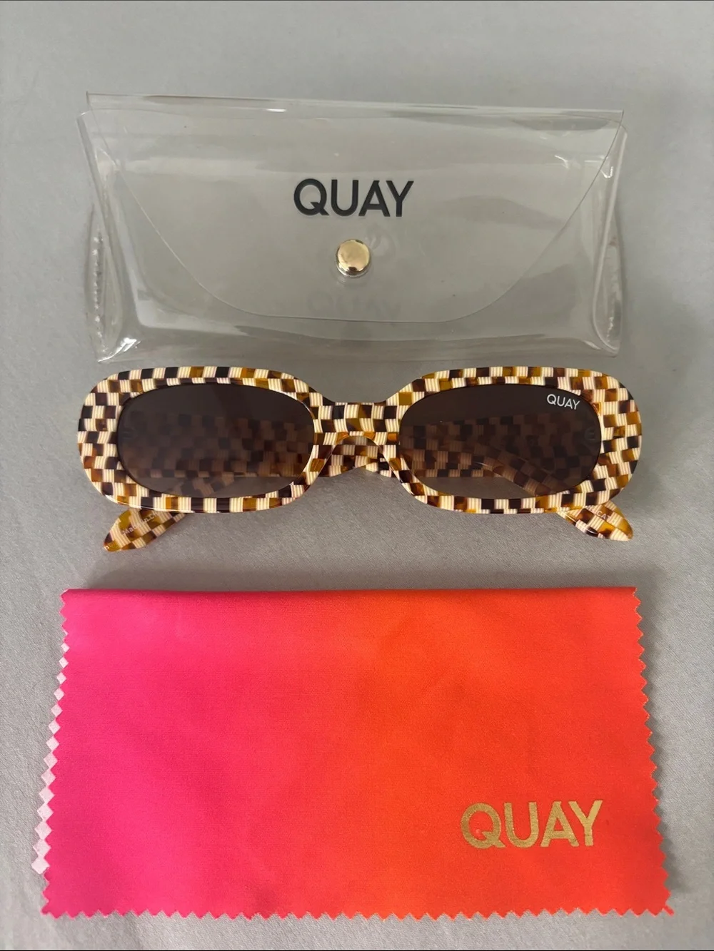 Quay Australia Checkered Brown and Cream Oval Sunglasses